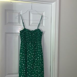 Green floral boutique dress with smocked top and tie!
